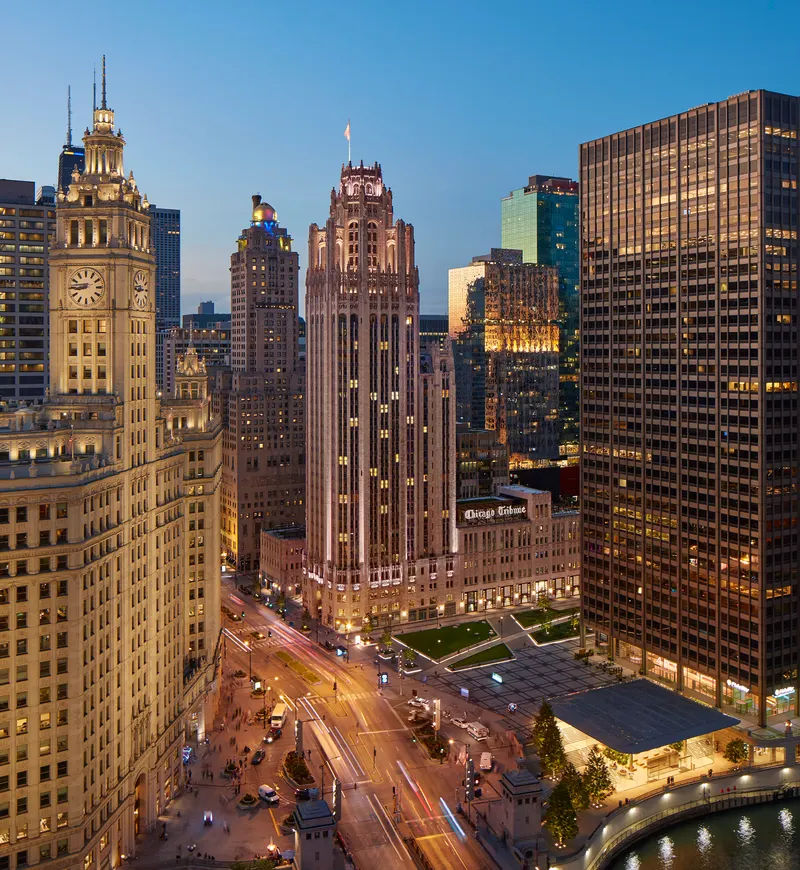 Tribune tower pioneer court night cityscape site design group